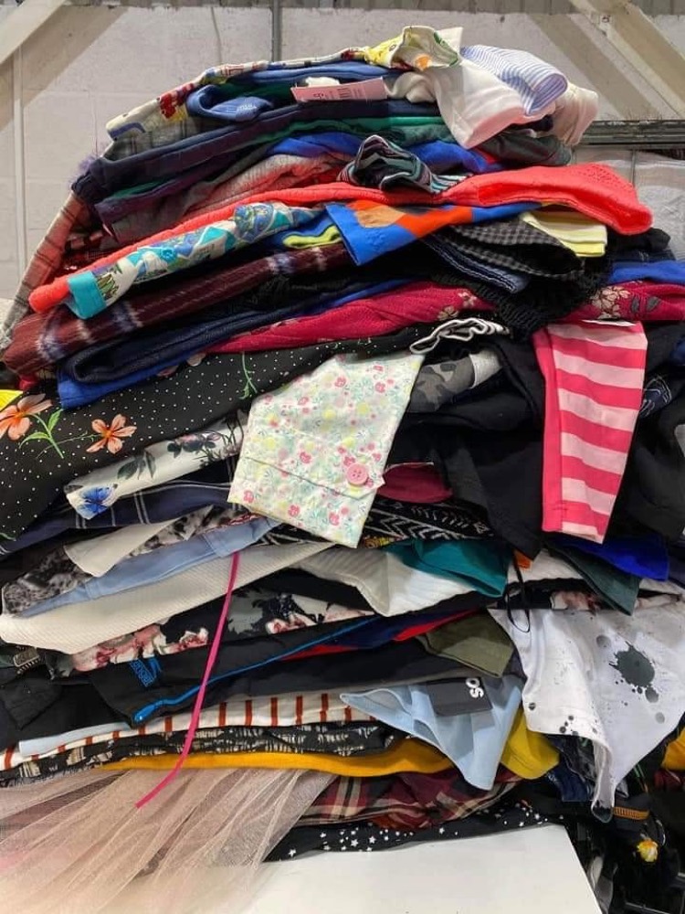 Bags of clothing ready to weigh